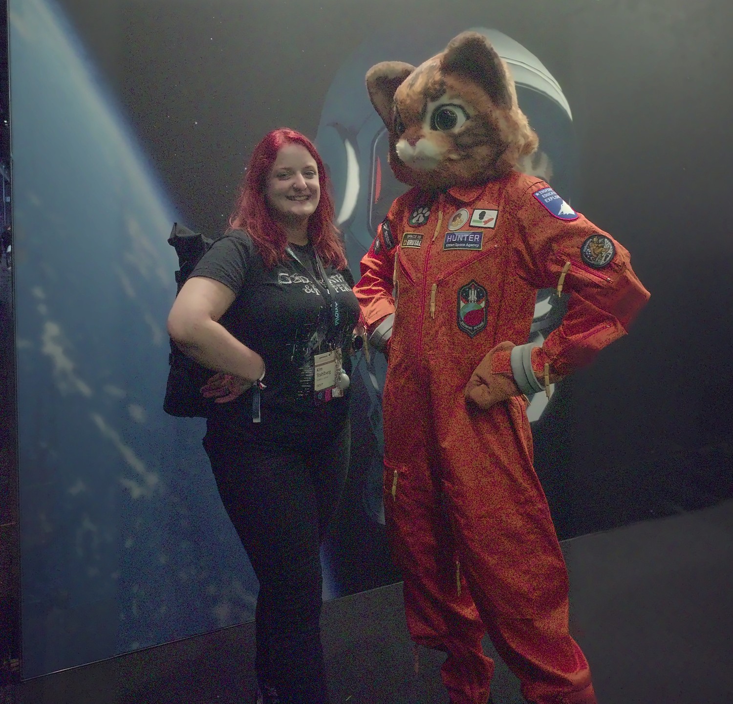 Kim Stahlberg with a game mascot on the gamescom 2026 show floor